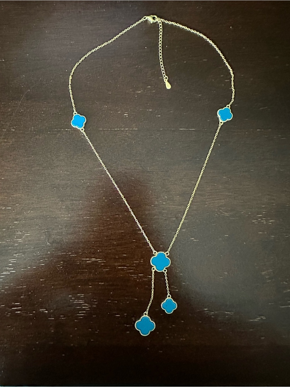 Gold-Tone Necklace with Bright Blue Clover Accents